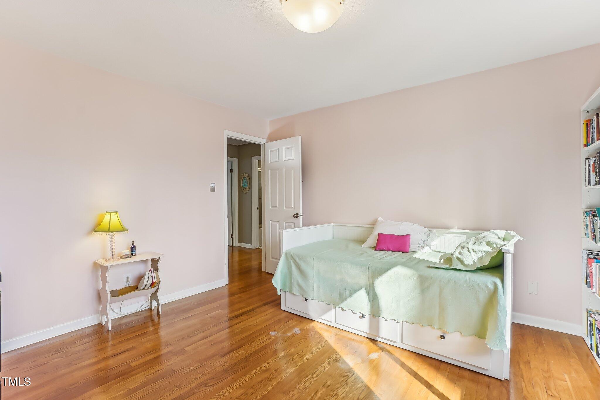 5410 Thayer Drive Raleigh, NC 27612 - Photo 22 of 36 a living room with hard wood flooring