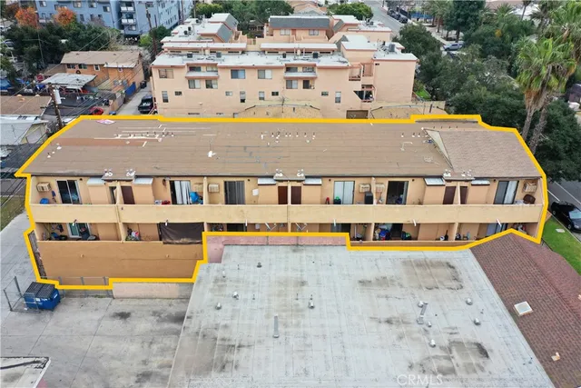 a aerial view of a house with swimming pool