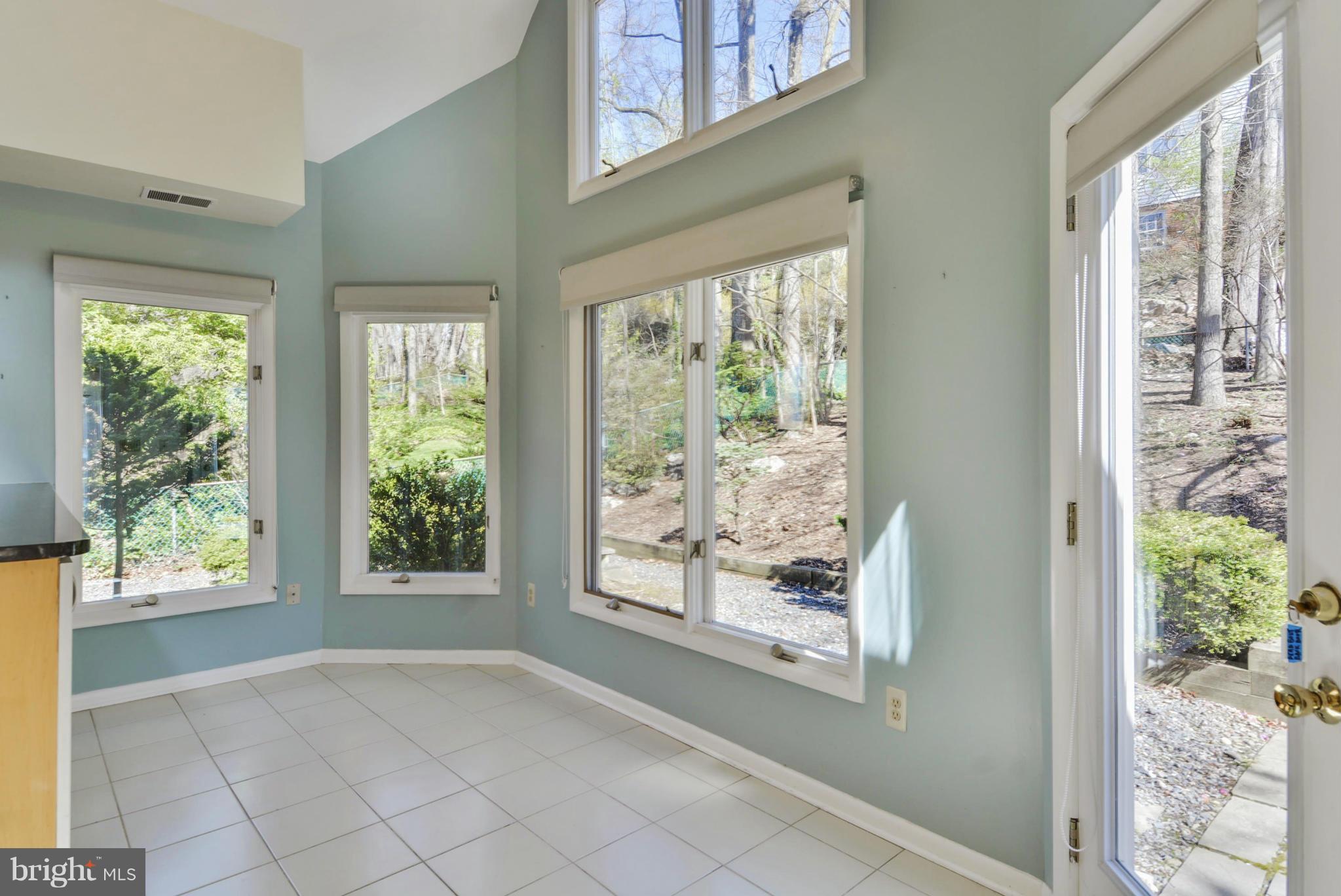 7701 Beech Tree Road Bethesda, MD 20817 - Photo 22 of 30 a view of an entryway with wooden floor