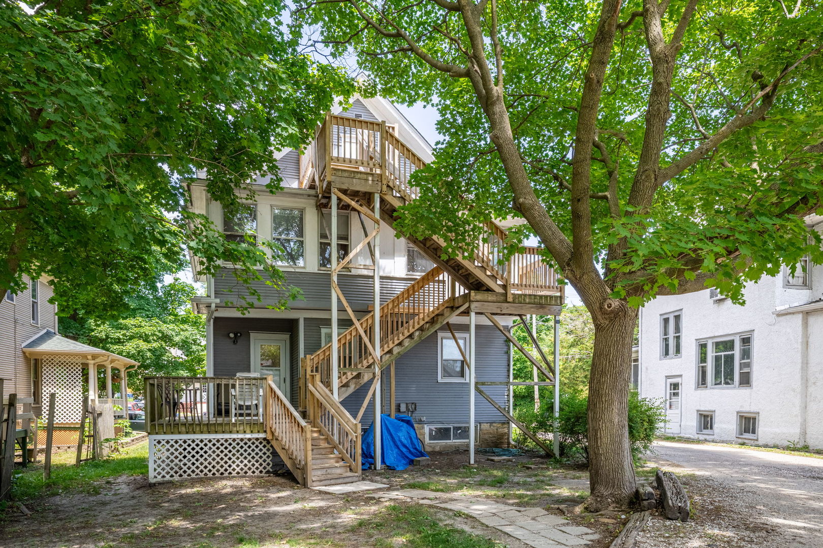 226 West Locust Street DeKalb, IL 60115 - Photo 29 of 40 a front view of a house with a tree