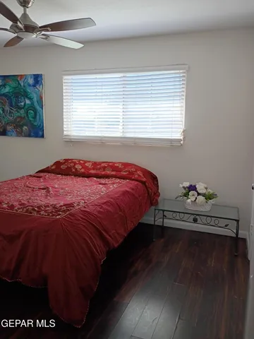 a room with wooden cabinets and outdoor seating