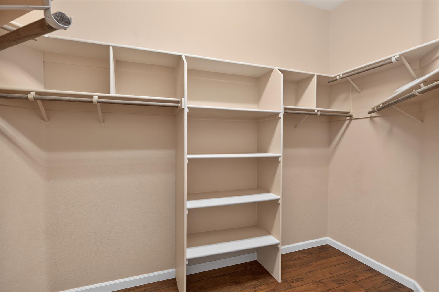 9601 Stablegate Road Wilton, CA 95693 - Photo 41 of 92 a view of walk in closet with empty racks