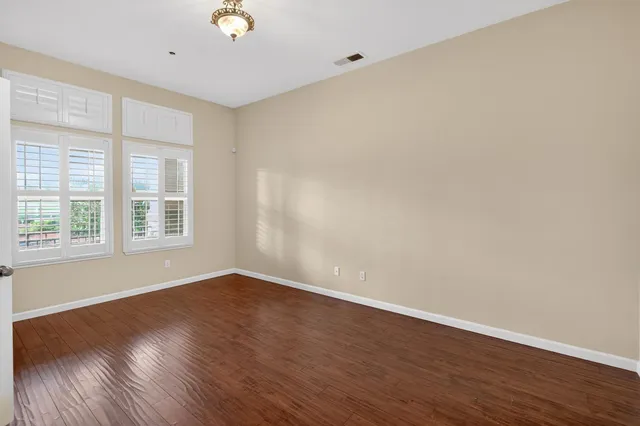a view of swimming pool with a yard and sitting area