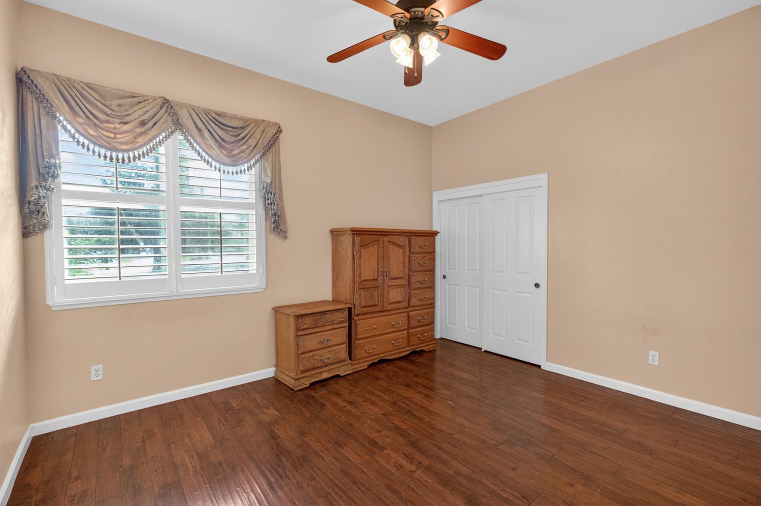 9601 Stablegate Road Wilton, CA 95693 - Photo 56 of 92 wooden floor in an empty room with a window