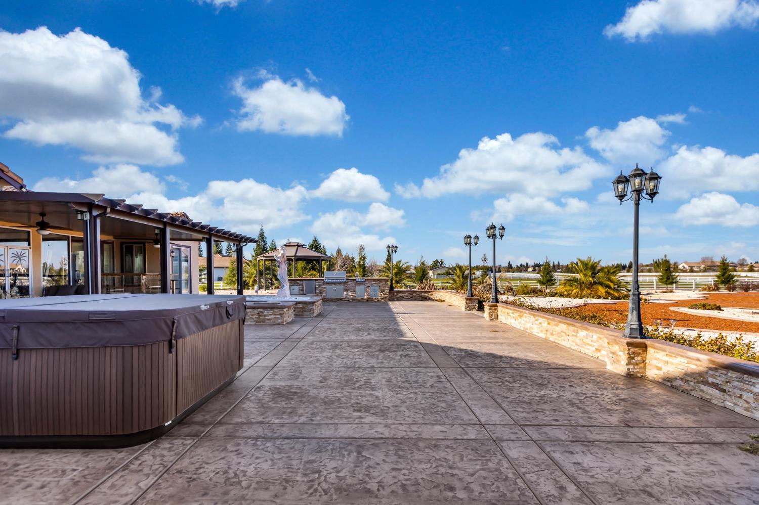 9601 Stablegate Road Wilton, CA 95693 - Photo 79 of 92 a view of a swimming pool with a lounge chair