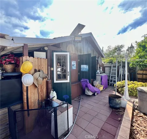 a view of a chairs and tables in patio