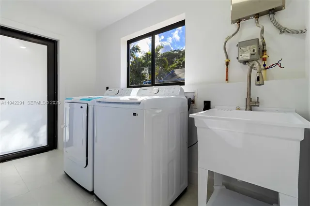 a utility room with dryer and washer