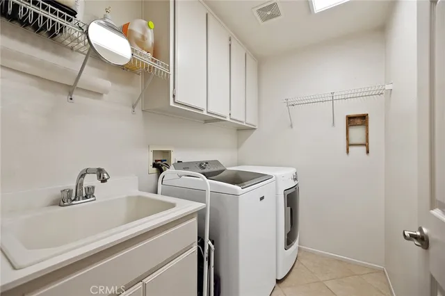 a view of a chairs and table in patio