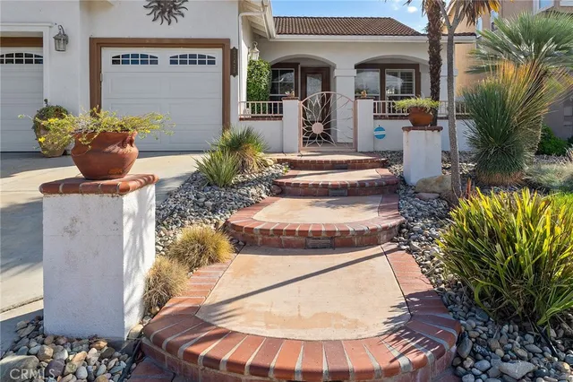a view of a living room and entry way