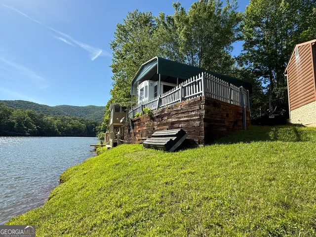a house with trees in the background
