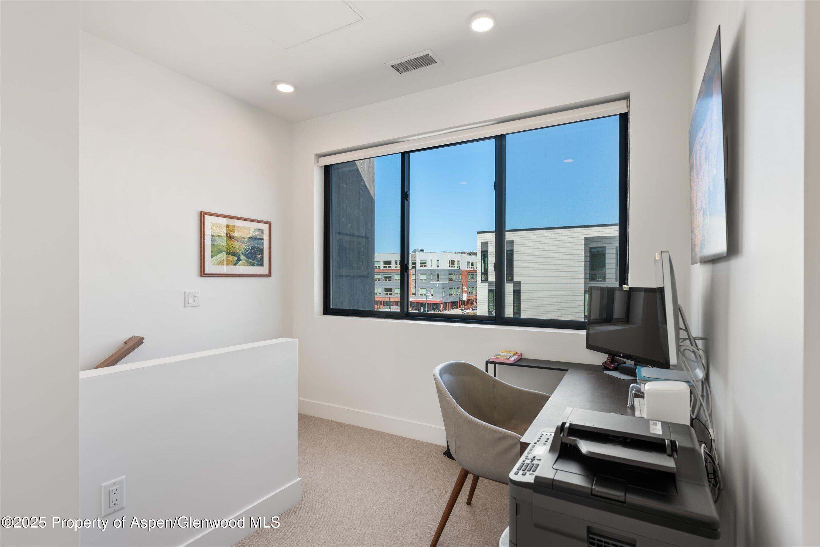 220 Lewis Lane Basalt, CO 81621 - Photo 21 of 32 a work place with furniture and window