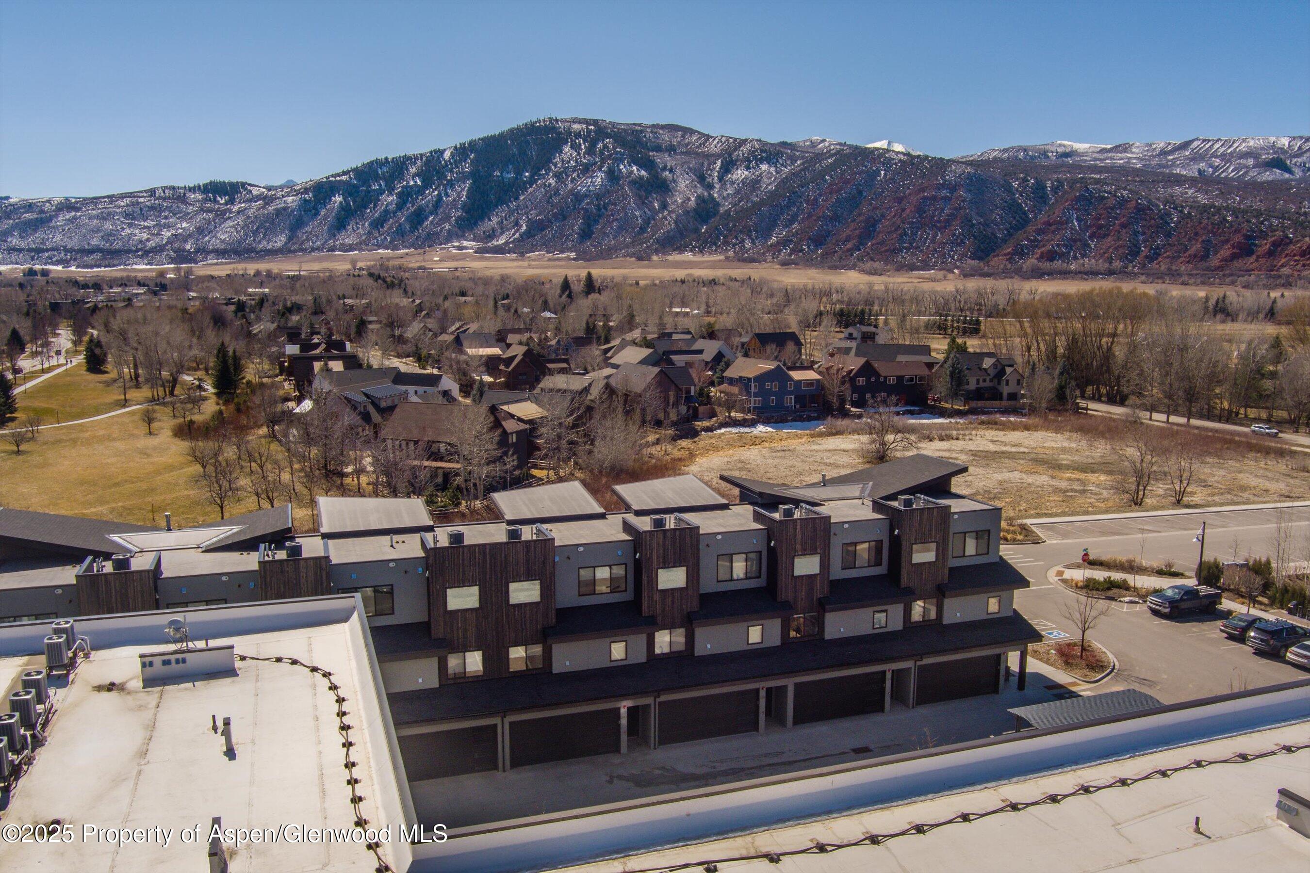 220 Lewis Lane Basalt, CO 81621 - Photo 31 of 32 a view of a house with a yard and sitting area