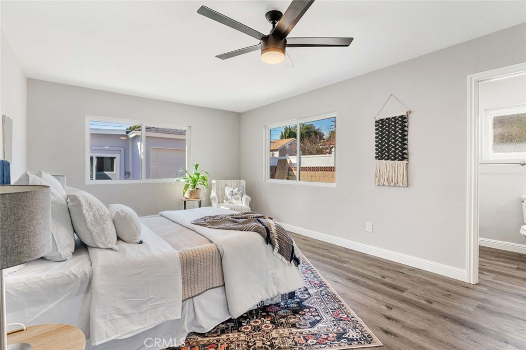 445 Via Val Verde Montebello, CA 90640 - Photo 19 of 51 a bedroom with a bed and wooden floor
