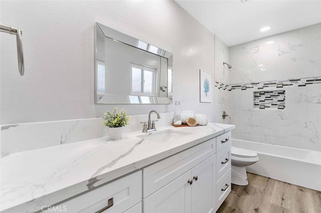 445 Via Val Verde Montebello, CA 90640 - Photo 25 of 51 a bathroom with a sink a toilet and a bathtub