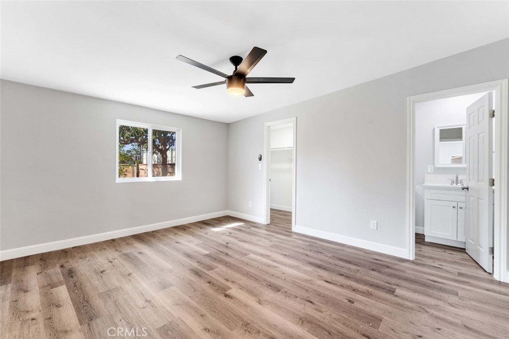 445 Via Val Verde Montebello, CA 90640 - Photo 35 of 51 a view of empty room with wooden floor and ceiling fan