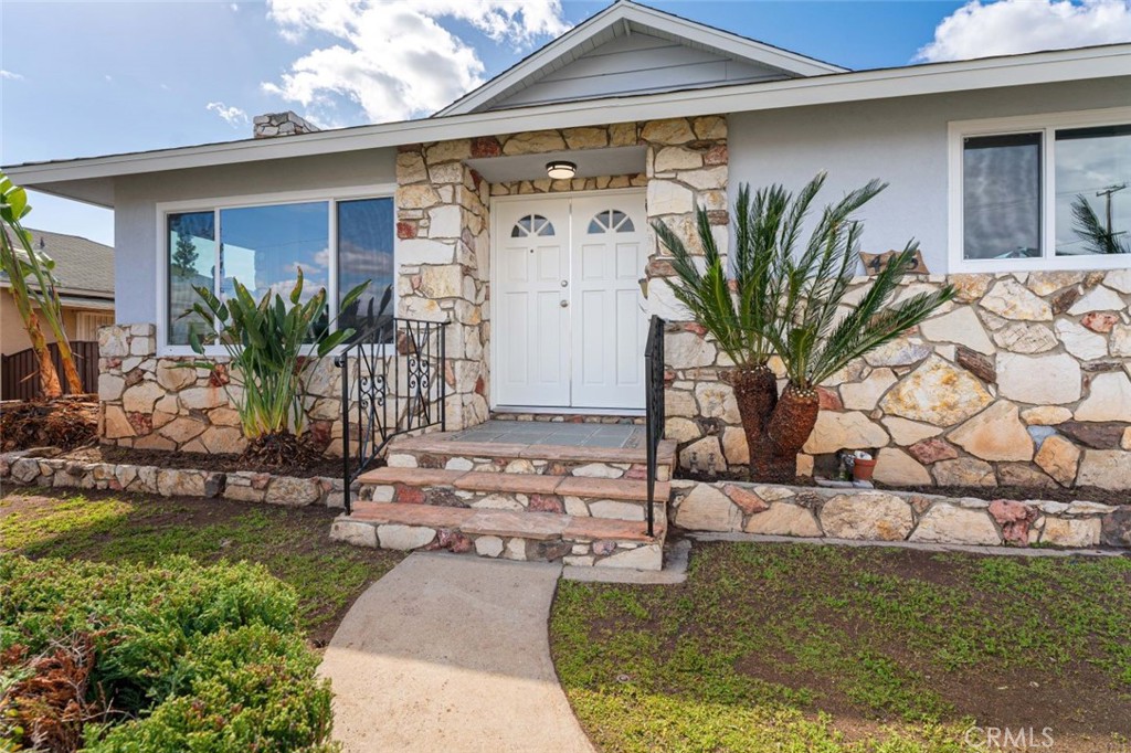 445 Via Val Verde Montebello, CA 90640 - Photo 4 of 51 a front view of a house with garden