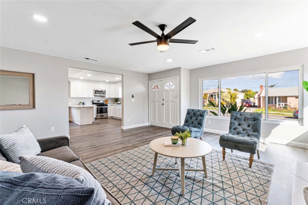 445 Via Val Verde Montebello, CA 90640 - Photo 9 of 51 a living room with furniture kitchen view and a table