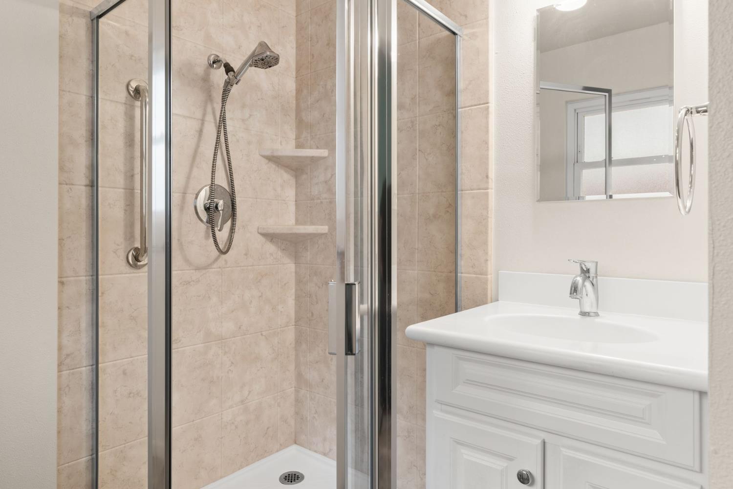 25 Hill Street Oak View, CA 93022 - Photo 12 of 16 a bathroom with a bath tub and a shower