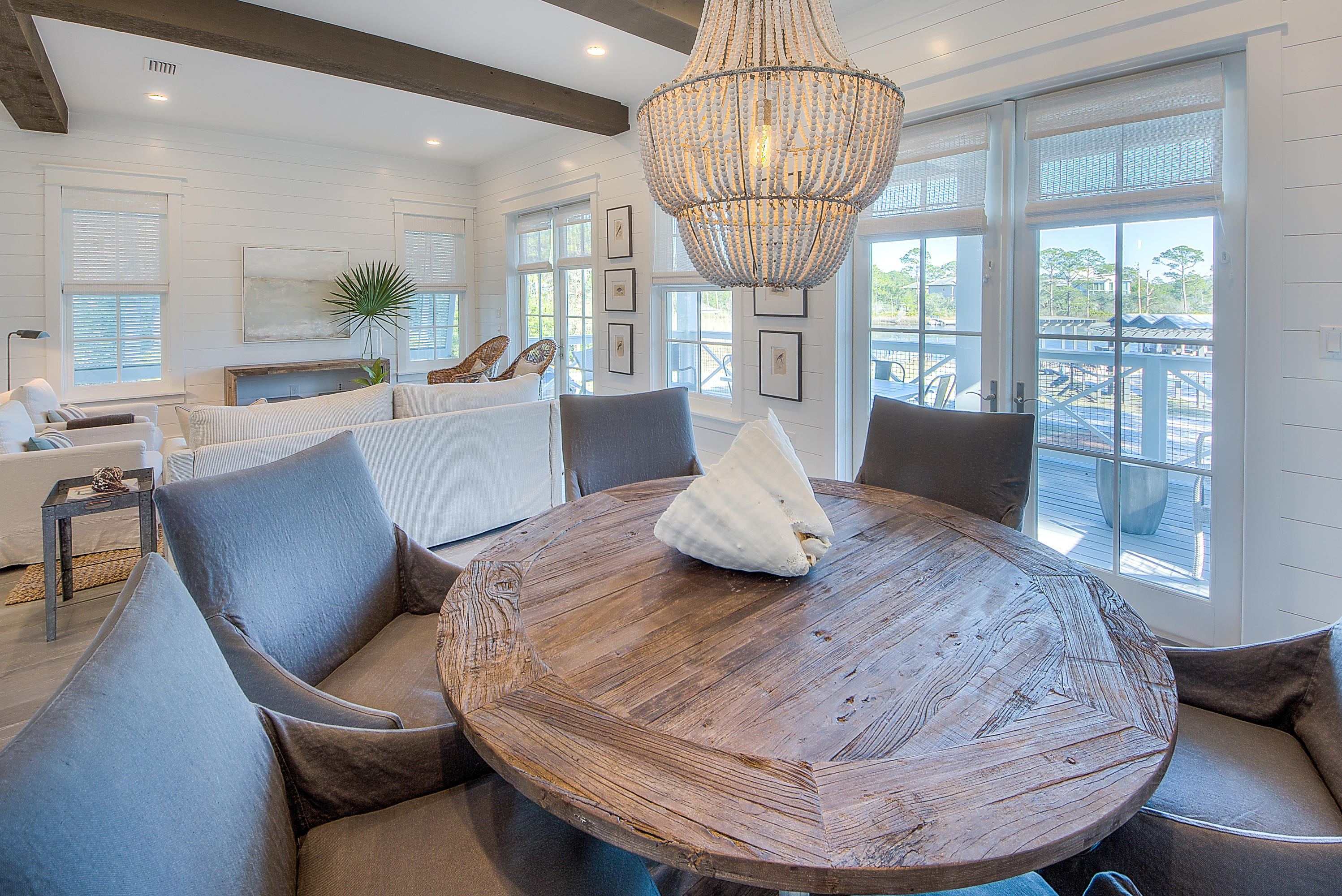 4 Garfield Street Santa Rosa Beach, FL 32459 - Photo 5 of 41 a view of a dining room with furniture wooden floor and chandelier