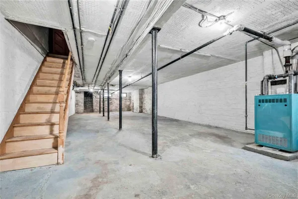 a view of staircase with white walls