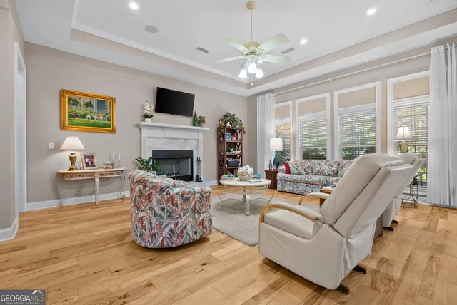 a kitchen with stainless steel appliances granite countertop a stove microwave and refrigerator