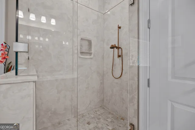 a bathroom with a bathtub and a sink