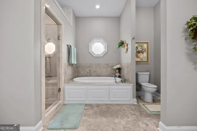 a view of a hallway with washer and dryer