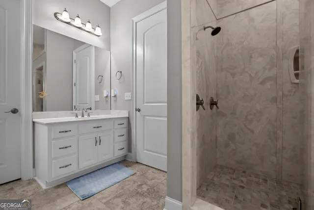 a front view of a house having yard and sitting area