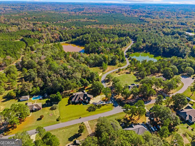 a view of an ocean and swimming pool