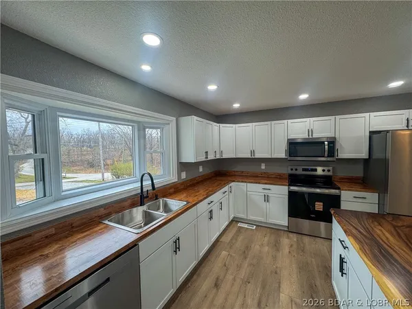 $294,500 | 117 Dunwurkin Road, Laurie, MO 65037