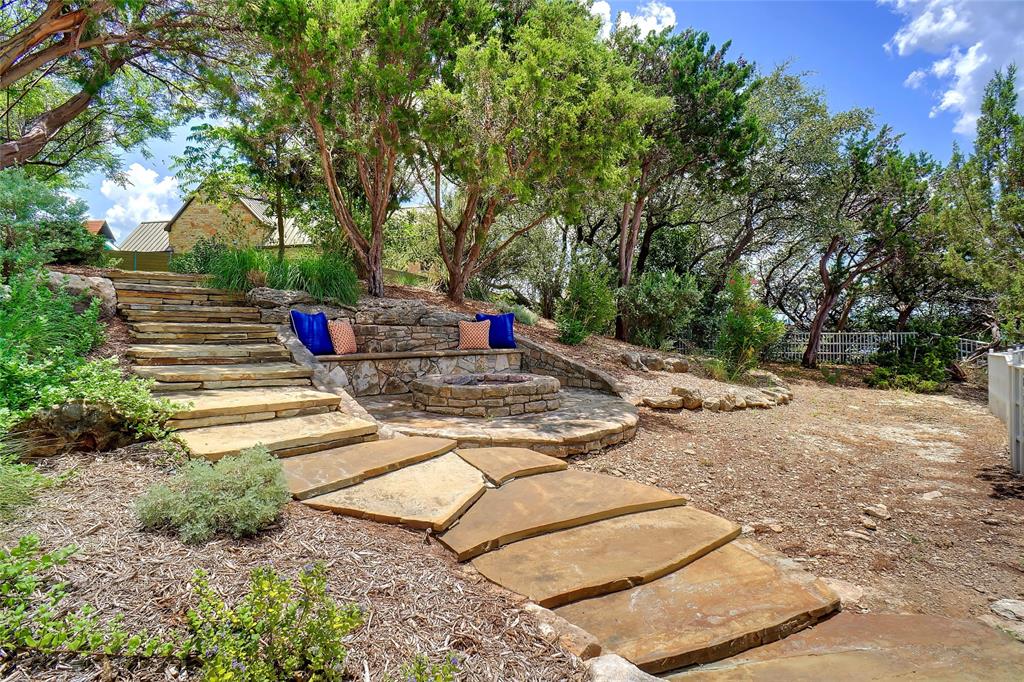 1003 Mesquite Ridge Graford, TX 76449 - Photo 9 of 40 Fire Pit area with Mature Shade Trees throughout the property