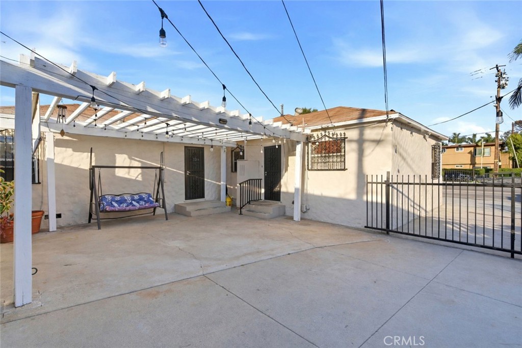 10731 Wright Road South Gate, CA 90280 - Photo 29 of 35 a view of a house with porch