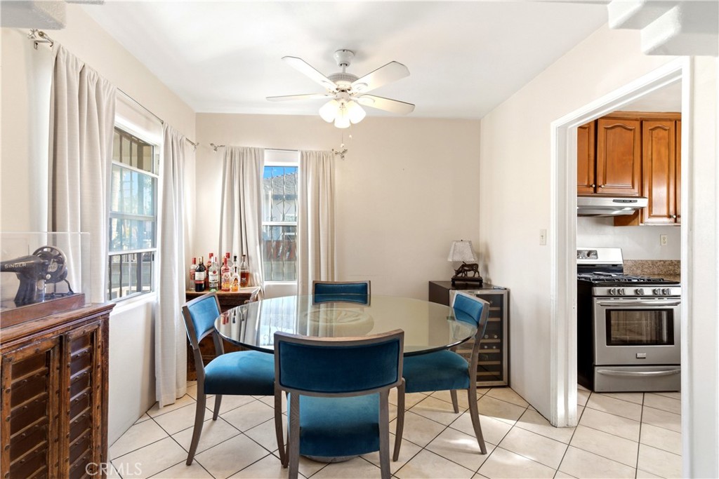 10731 Wright Road South Gate, CA 90280 - Photo 8 of 35 a dining room with furniture and window