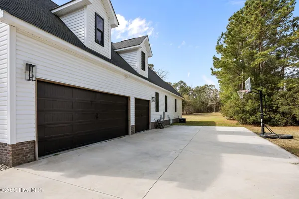 $869,900 | 111 Blue Jay Way, Stella, NC 28582