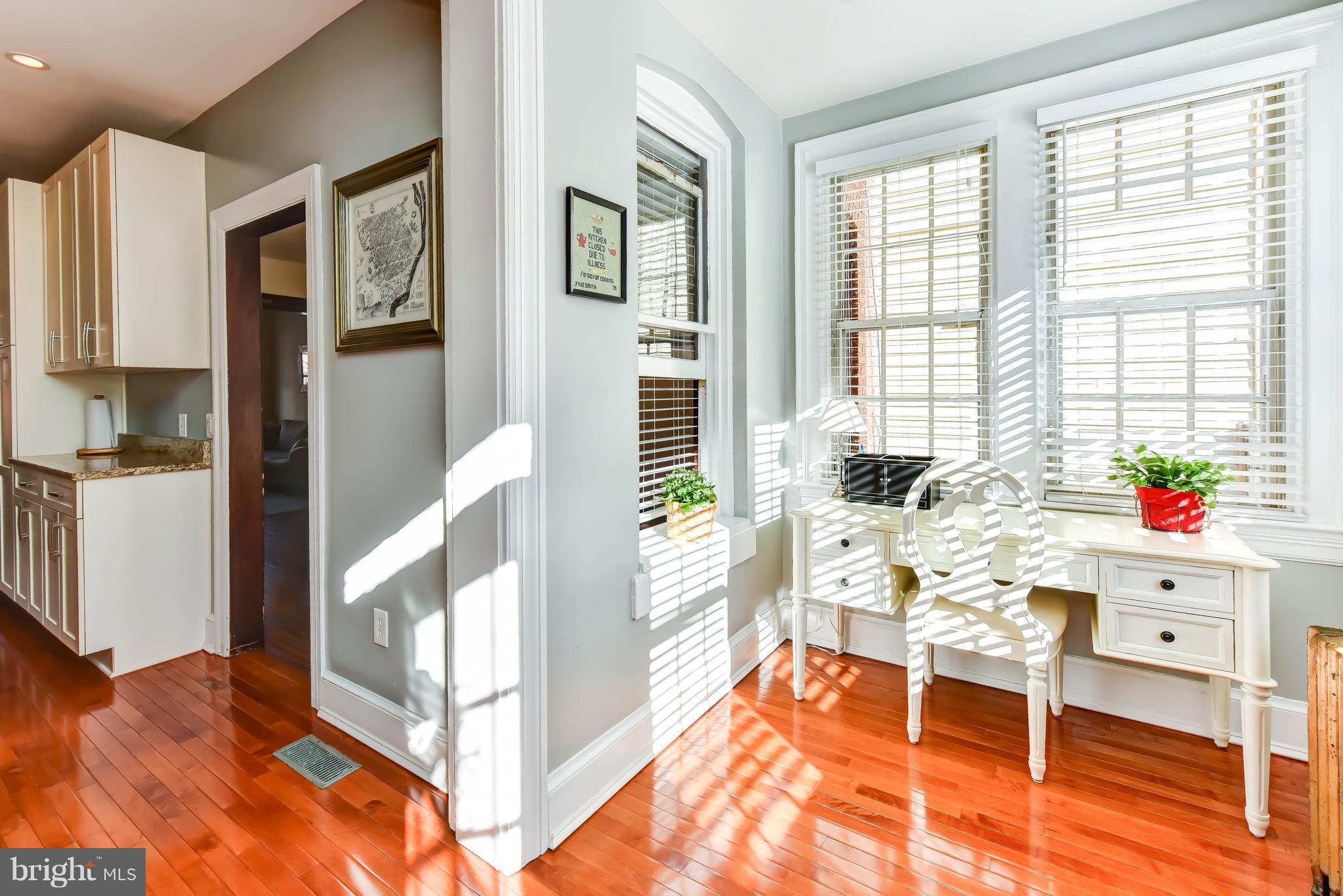 637 E Street Northeast Washington, DC 20002 - Photo 14 of 29 a living room with furniture and a table
