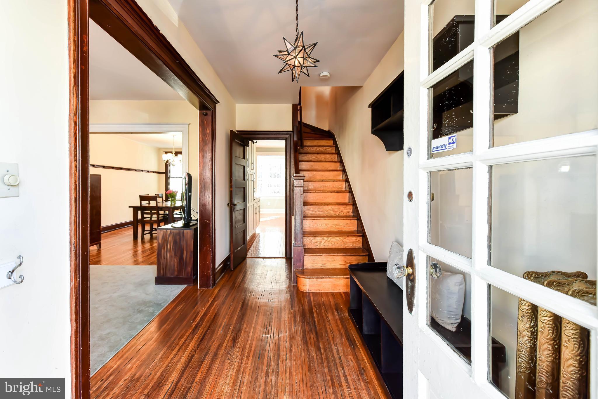 637 E Street Northeast Washington, DC 20002 - Photo 3 of 29 a view of a hallway with wooden floor and staircase