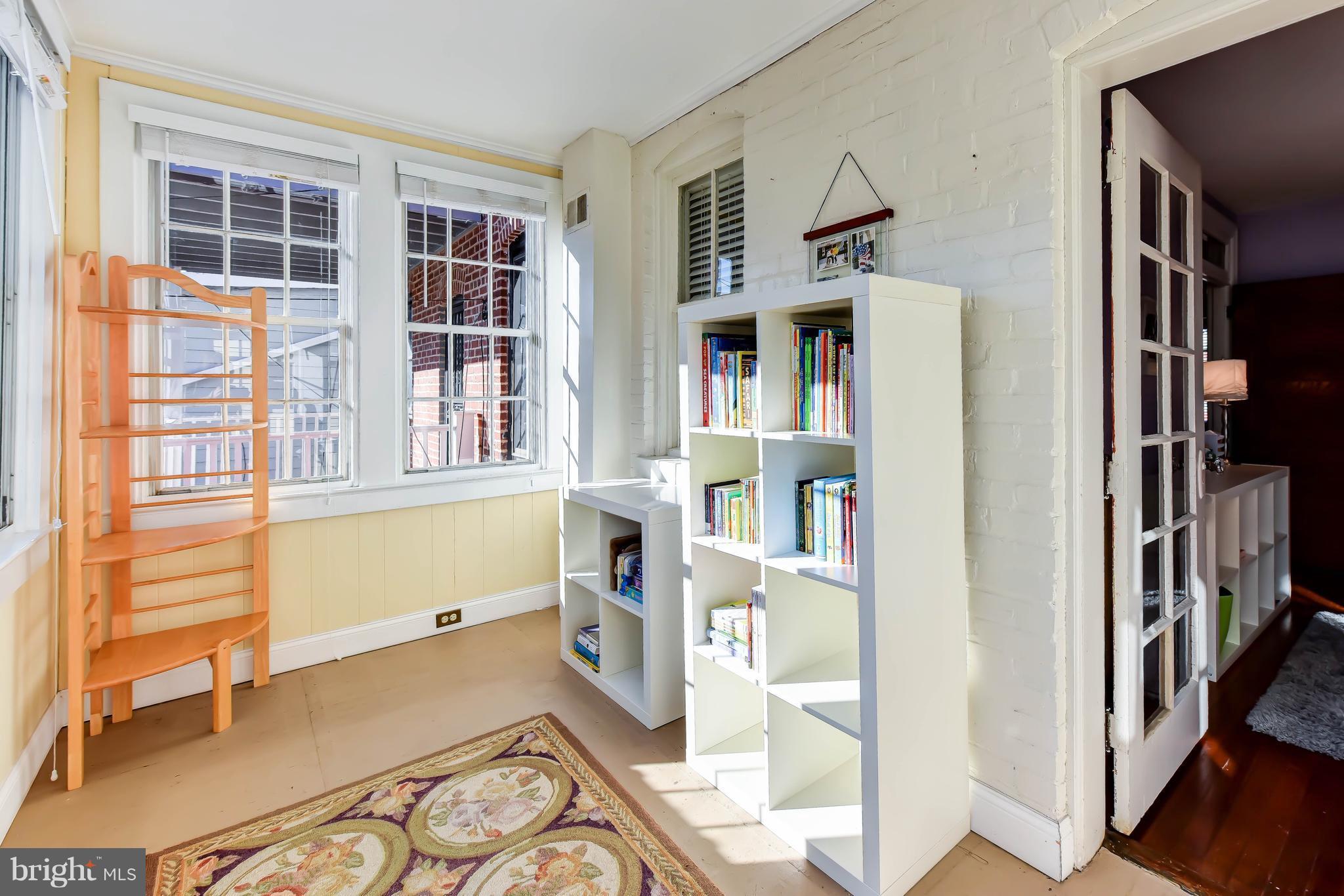 637 E Street Northeast Washington, DC 20002 - Photo 23 of 29 a view of bedroom with furniture and book shelf