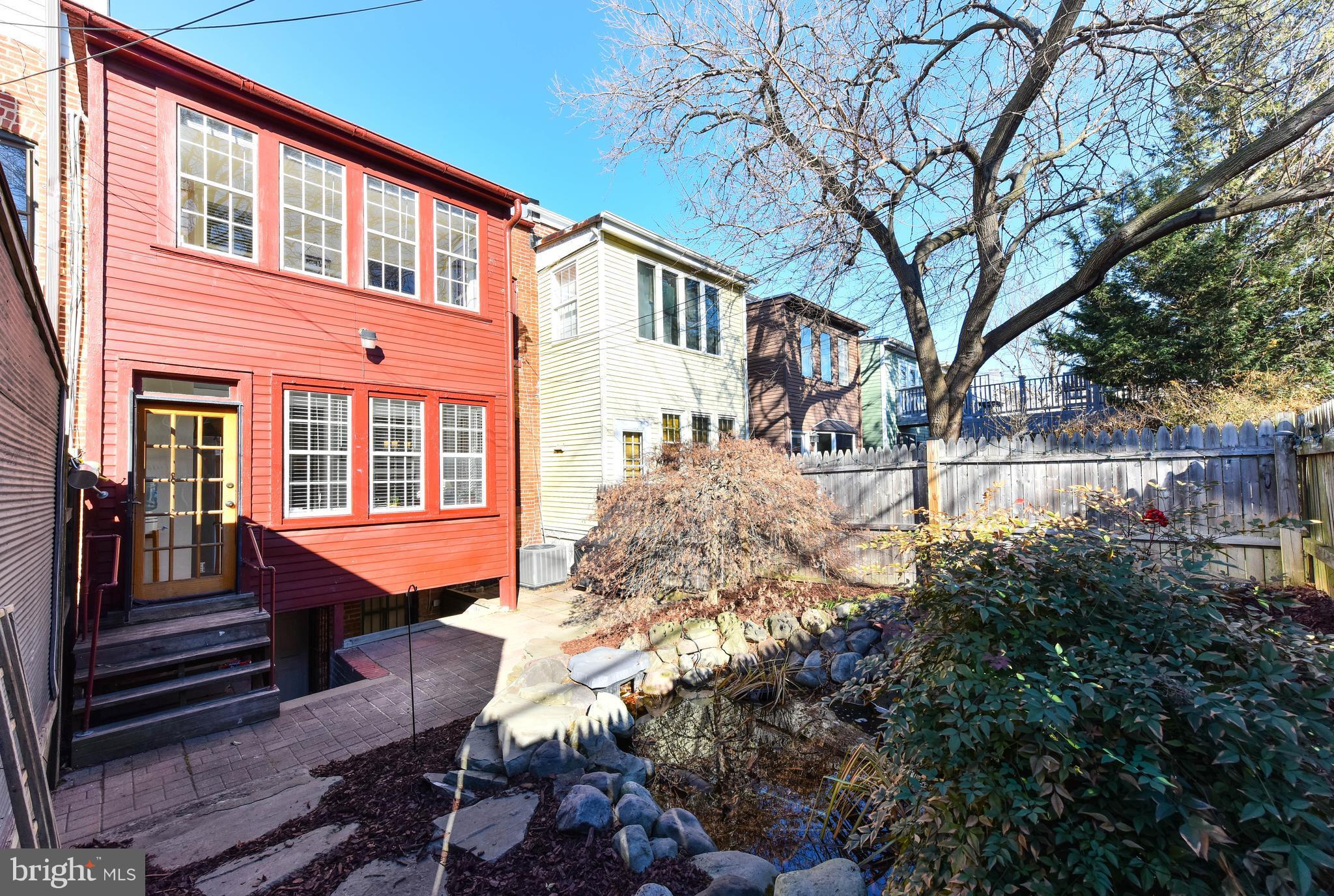 637 E Street Northeast Washington, DC 20002 - Photo 29 of 29 a front view of a house with a yard covered with snow