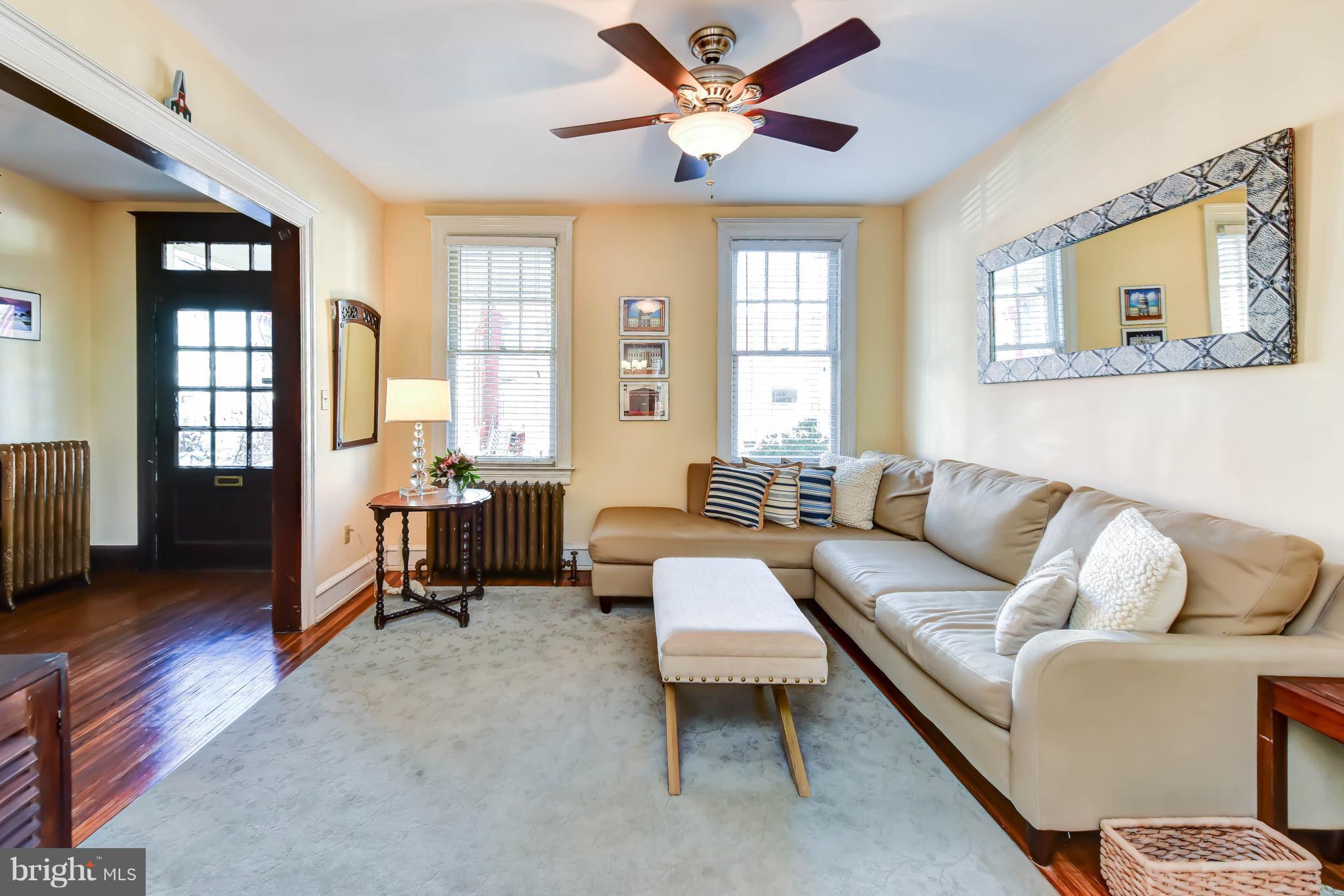 637 E Street Northeast Washington, DC 20002 - Photo 6 of 29 a living room with furniture and a window