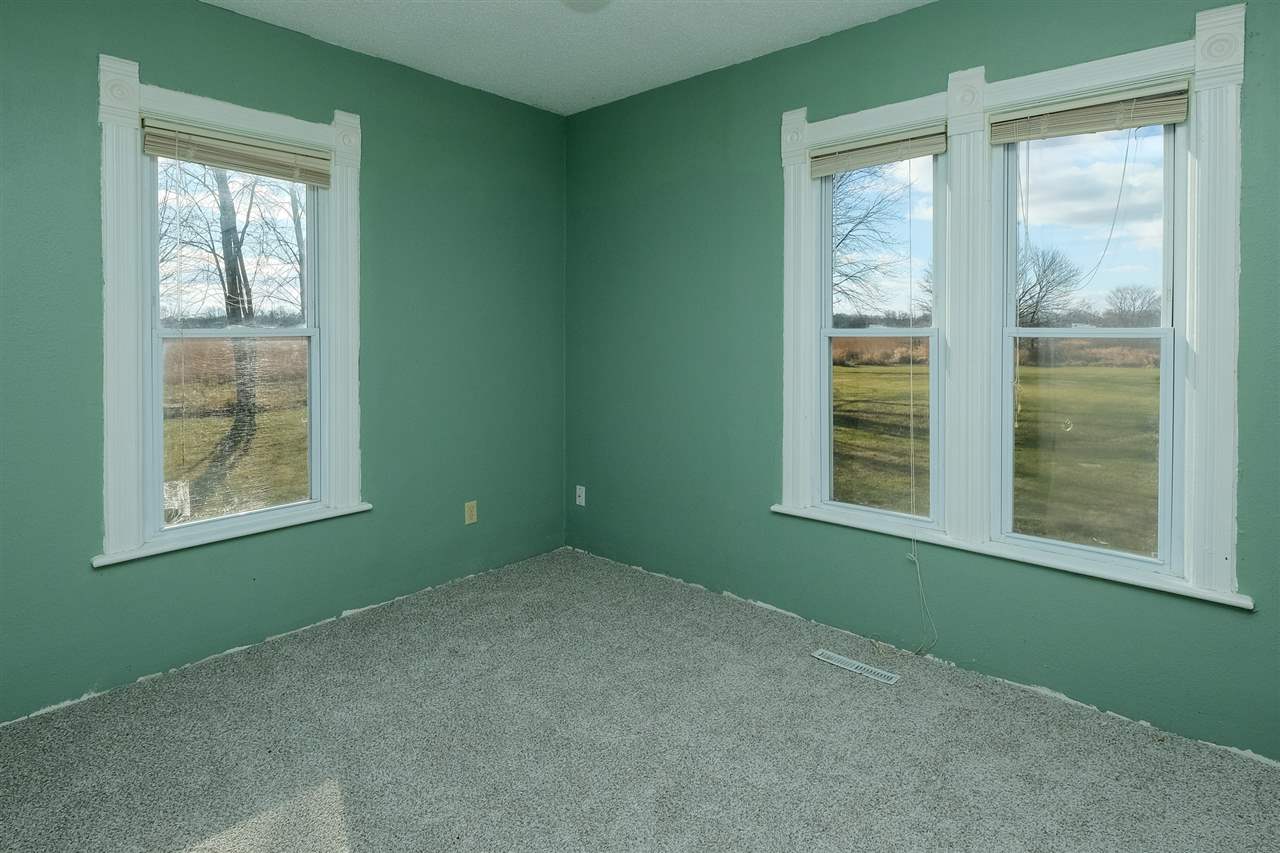 16108 Anderson Road Pecatonica, IL 61063 - Photo 17 of 25 an empty room with windows