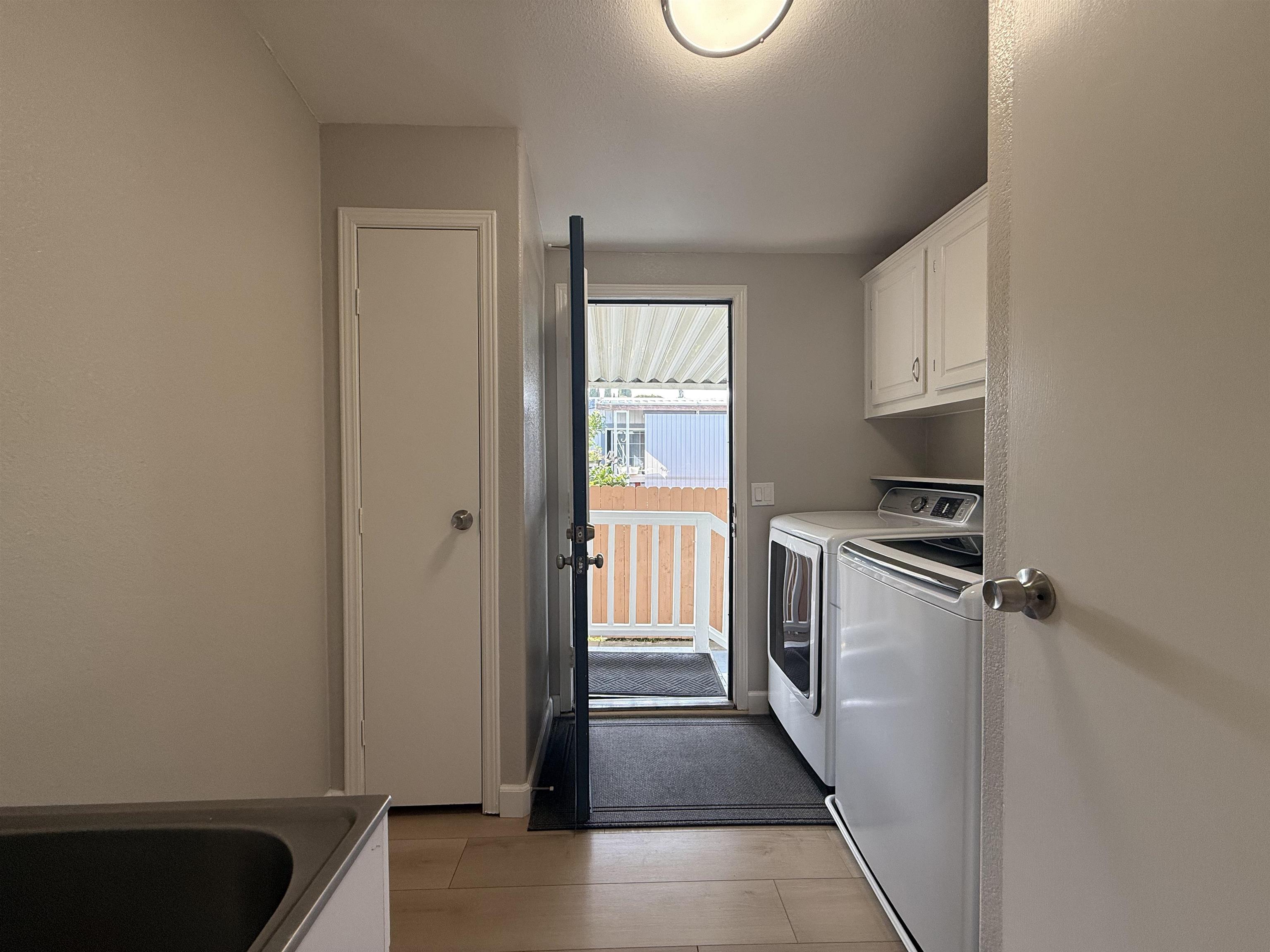 2151 Oakland Road, Unit 232 San Jose, CA 95131 - Photo 13 of 17 a kitchen with a refrigerator and a sink