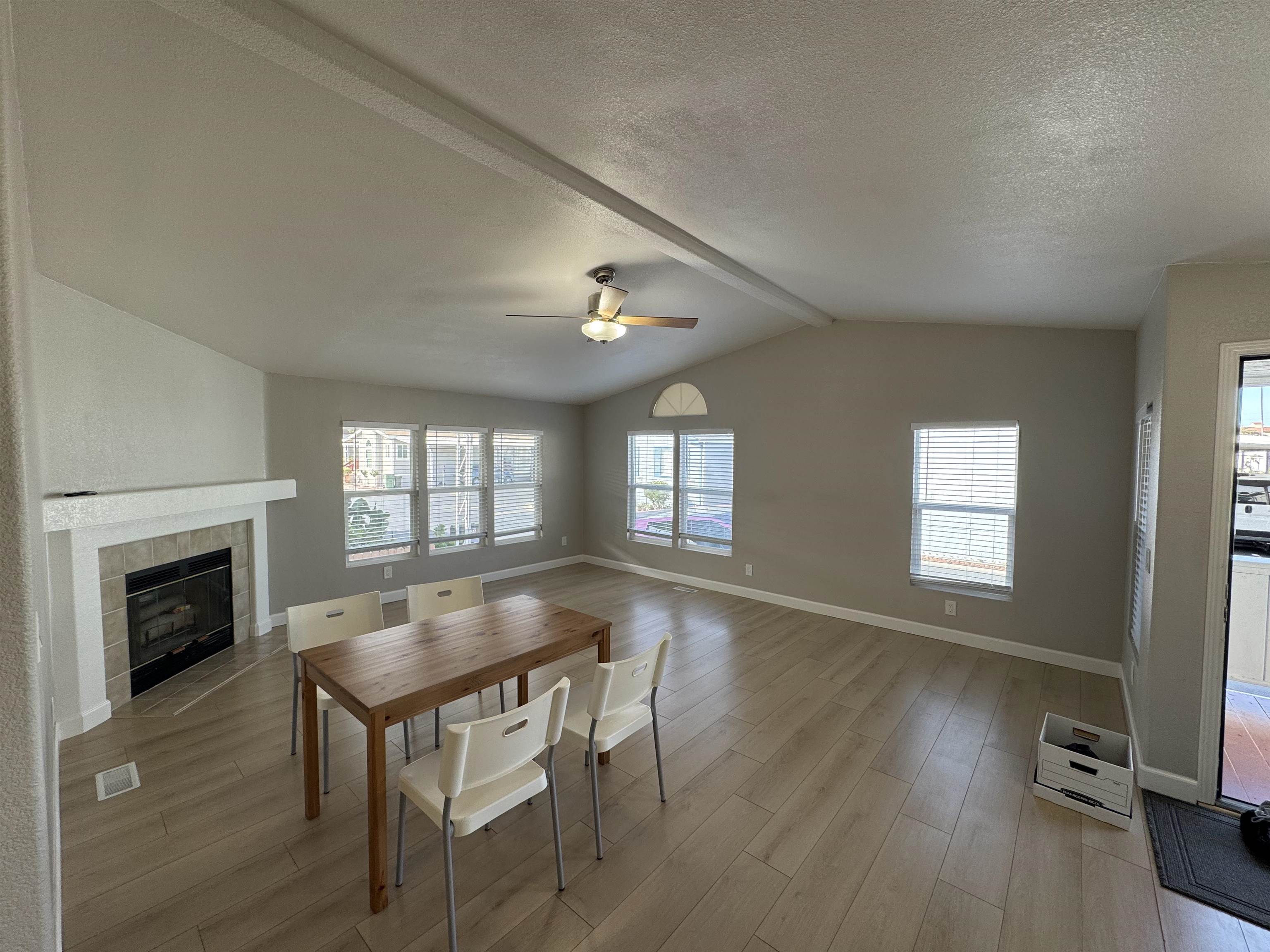 2151 Oakland Road, Unit 232 San Jose, CA 95131 - Photo 3 of 17 a living room with furniture and a fireplace