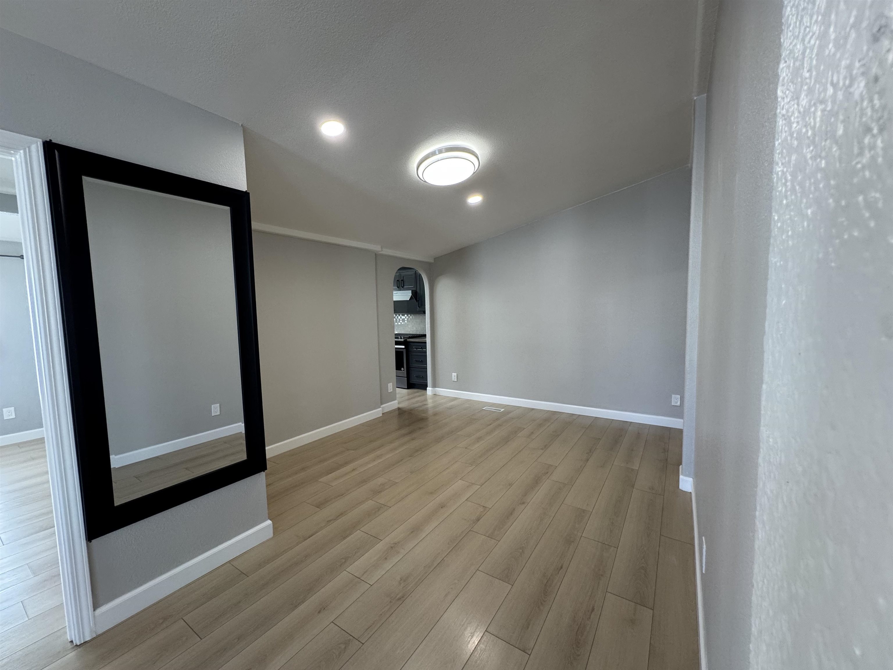 2151 Oakland Road, Unit 232 San Jose, CA 95131 - Photo 5 of 17 a view of hallway with wooden floor