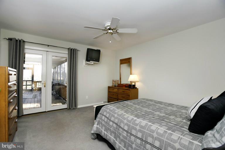 119 Harmony Hall Road Gaithersburg, MD 20877 - Photo 25 of 28 Bedroom (Master) w/French Doors to Screened Porch