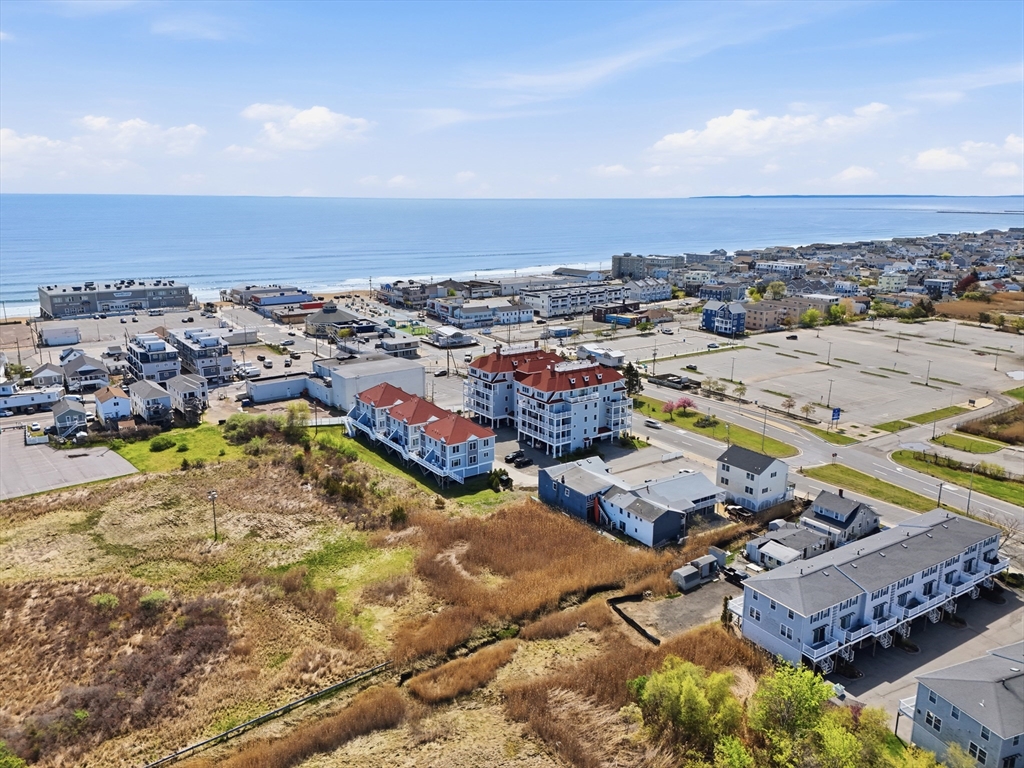 233 Beach Road, Unit A11 Salisbury, MA 01952 - Photo 4 of 37 an aerial view of residential houses with outdoor space