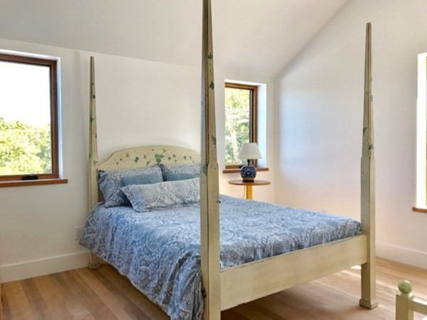 15 Loon Lane Chilmark, MA 02535 - Photo 18 of 29 a bedroom with a large bed and a window