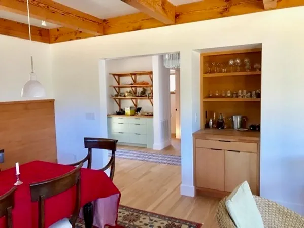 a living room with furniture and window