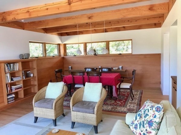 15 Loon Lane Chilmark, MA 02535 - Photo 9 of 29 a view of a dining room with furniture and wooden floor
