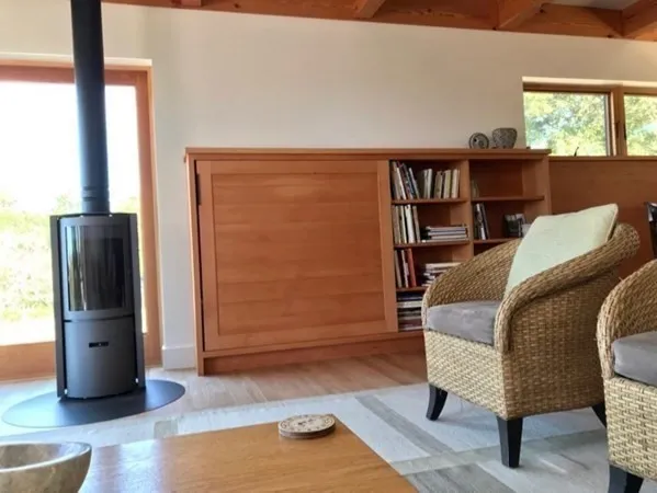 a bed room with a bed and a window