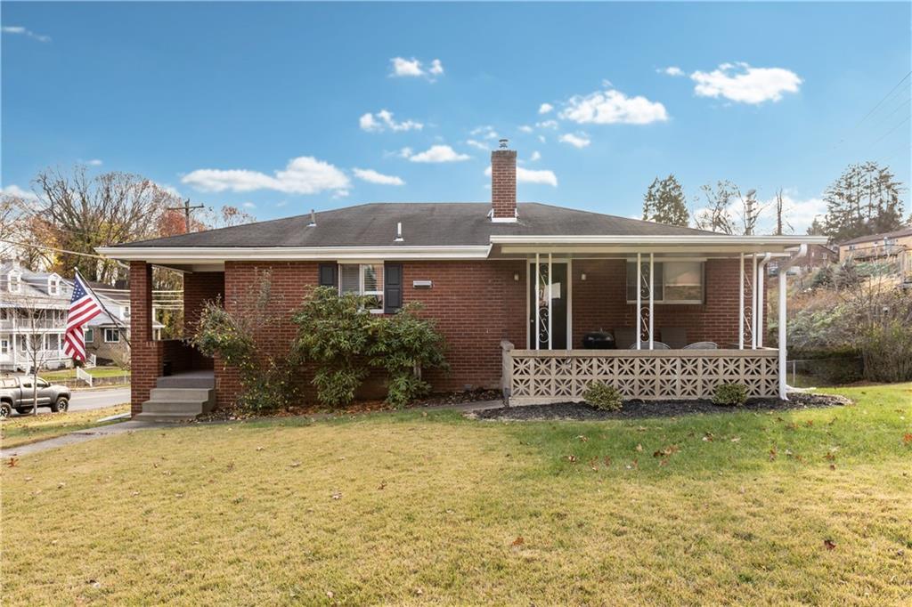 3407 Brighton Road Pittsburgh, PA 15212 - Photo 1 of 27 a front view of a house with garden